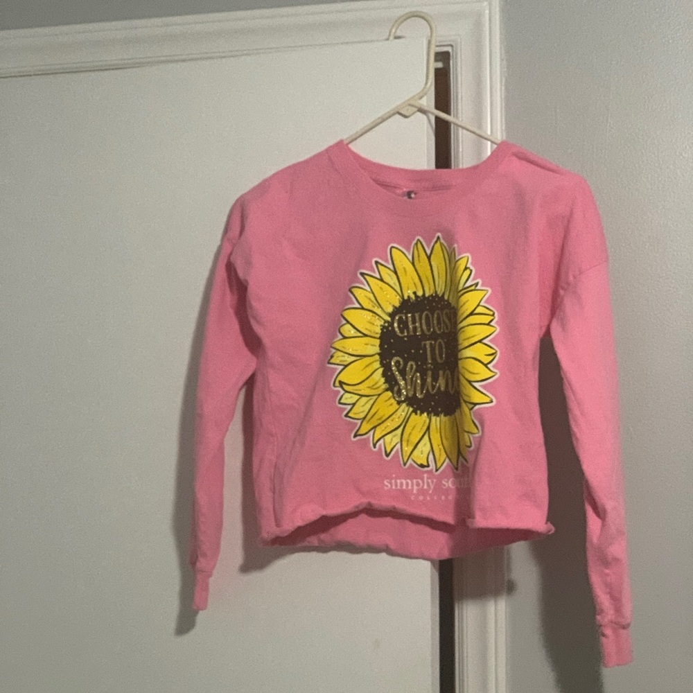 A lone sleeved crop top